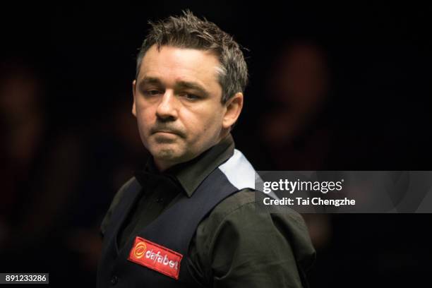 Alan McManus of Scotland reacts during his first round match against Matthew Selt of England on day two of the 2017 Scottish Open at Emirates Arena...