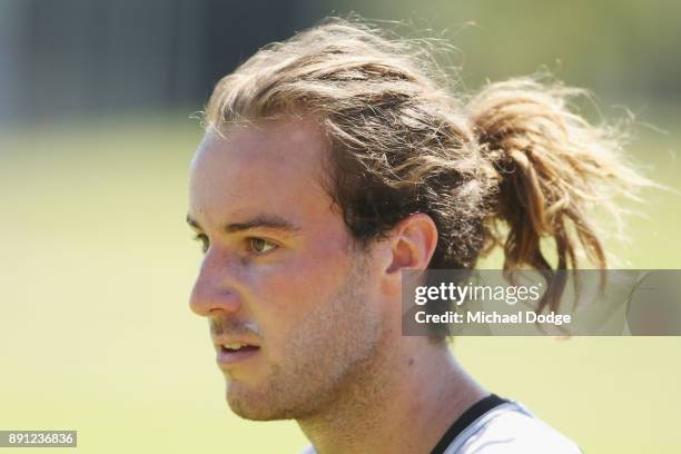 Tim Broomhead looks upfield during a Collingwood Magpies AFL training session on December 13, 2017 in Melbourne, Australia.