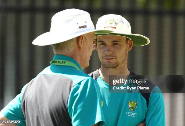 Peter Handscomb of Australia speaks with Australian Selector Greg Chappell during an Australian nets session ahead of the Third Test of the 2017/18...