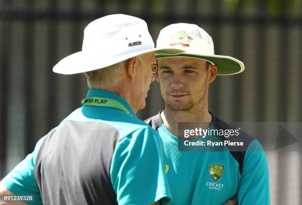 Peter Handscomb of Australia speaks with Australian Selector Greg Chappell during an Australian nets session ahead of the Third Test of the 2017/18...