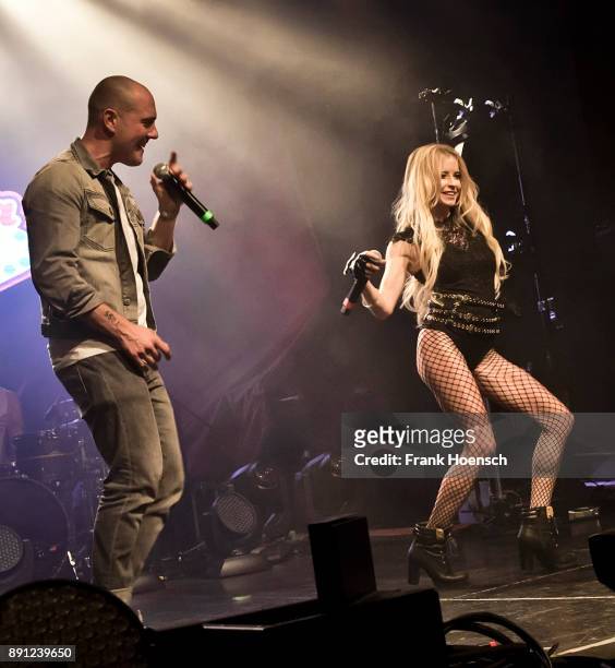 German singer Oliver Petszokat aka Oli P. And Mia Julia perform live on stage during a concert at the Columbia Theater on December 12, 2017 in...