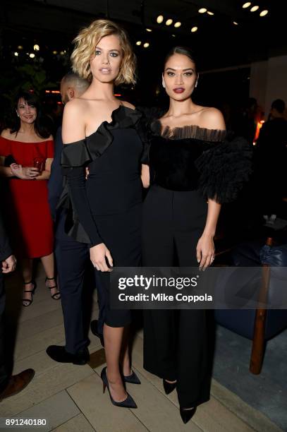 Models Hailey Clauson and Shanina Shaik attends the CR Fashion Book Celebrating launch of CR Girls 2018 with Technogym at Spring Place on December...