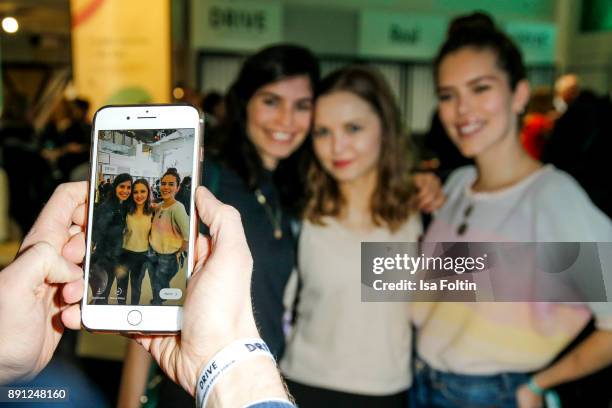 Cell phone view of German actress and Blogger Tanja Lehmann, German actress and Blogger Marija Mauer and German actress and Blogger Marielena Krewer...