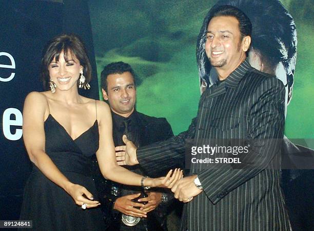 Indian actors Manshi Escott Rohit Roy and Gulshan Grover at a launch party for the Bollywood film 'Acid Factory' in Mumbai late July 20, 2009. The...