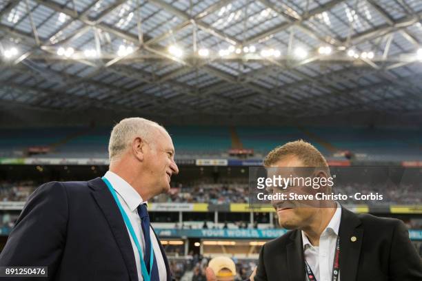 Graham Arnold of Sydney FC talks to Wanderers Josep Gombau before kick off in the round ten A-League match between the Western Sydney Wanderers and...