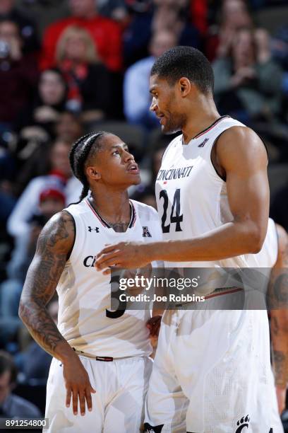 Justin Jenifer and Kyle Washington of the Cincinnati Bearcats react in the first half of a game against the Mississippi State Bulldogs at BB&T Arena...