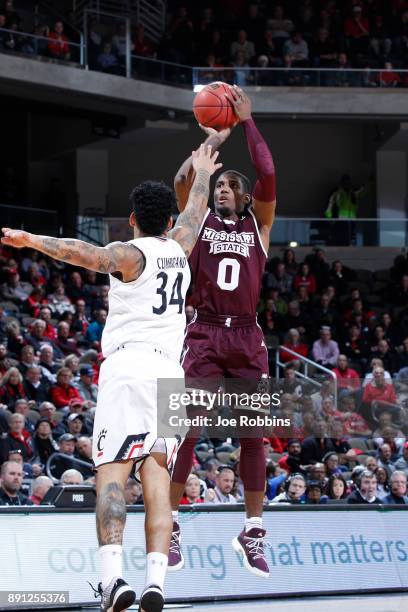 Nick Weatherspoon of the Mississippi State Bulldogs shoots the ball against the Cincinnati Bearcats in the first half of a game at BB&T Arena on...