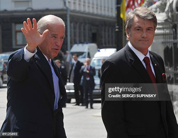 Vice President Joe Biden waves as he is welcomed by Ukrainian President of Viktor Yushchenko in Kiev on July 21, 2009. Biden was to meet the leaders...