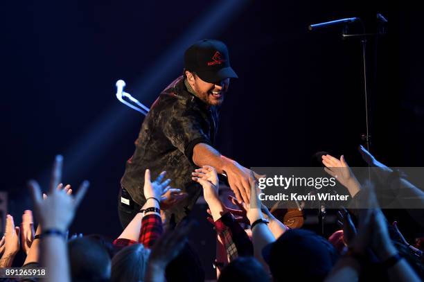 Luke Bryan performs onstage during the iHeartCountry Album Release Party at iHeartRadio Theater on December 12, 2017 in Burbank, California.