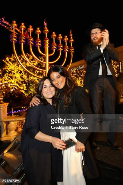 Chana Fogelman, Emmanuelle Chriqui and Rabbi Zamy Fogelman at the Village Synagogue and Emmanuelle Chriqui Host Menorah Lighting Ceremony at The...