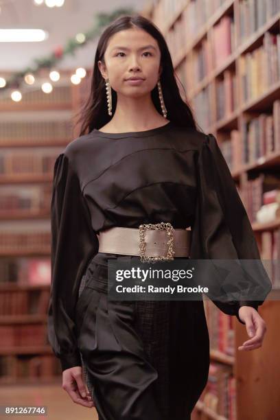 Model walks the runway during the Koche Pre-Fall 2018 Runway Show at Strand Bookstore on December 12, 2017 in New York City.