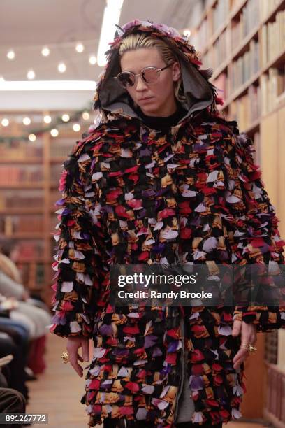 Model walks the runway during the Koche Pre-Fall 2018 Runway Show at Strand Bookstore on December 12, 2017 in New York City.