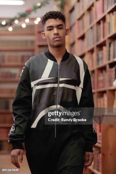 Model walks the runway during the Koche Pre-Fall 2018 Runway Show at Strand Bookstore on December 12, 2017 in New York City.