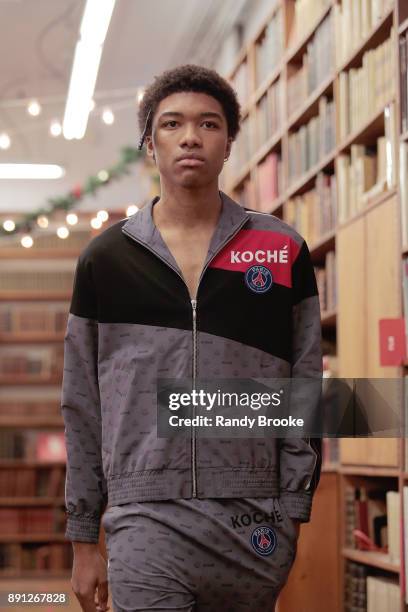 Model walks the runway during the Koche Pre-Fall 2018 Runway Show at Strand Bookstore on December 12, 2017 in New York City.