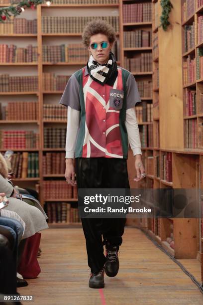 Model walks the runway during the Koche Pre-Fall 2018 Runway Show at Strand Bookstore on December 12, 2017 in New York City.