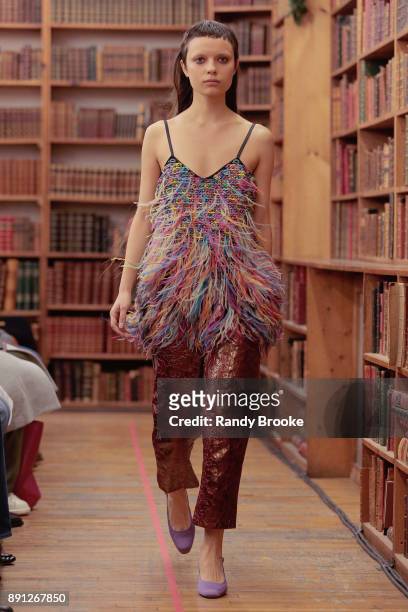 Model walks the runway during the Koche Pre-Fall 2018 Runway Show at Strand Bookstore on December 12, 2017 in New York City.