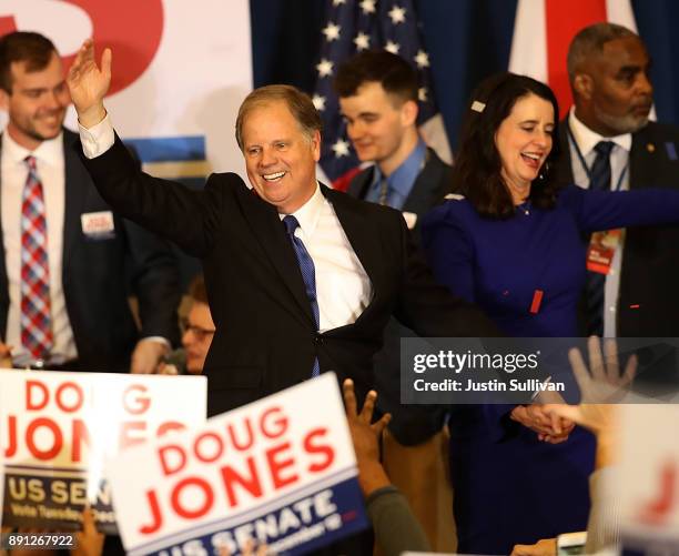 Democratic U.S. Senator elect Doug Jones greets supporters during his election night gathering the Sheraton Hotel on December 12, 2017 in Birmingham,...