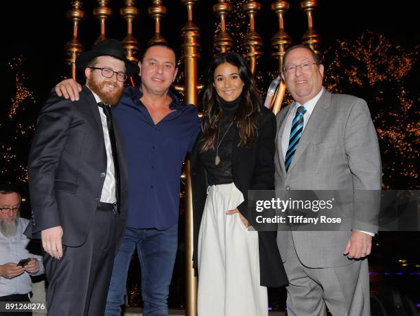 Rabbi Zamy Fogelman, Alexander Sachs, Emmanuelle Chriqui and Councilmember Paul Koretz at the Village Synagogue and Emmanuelle Chriqui Host Menorah...