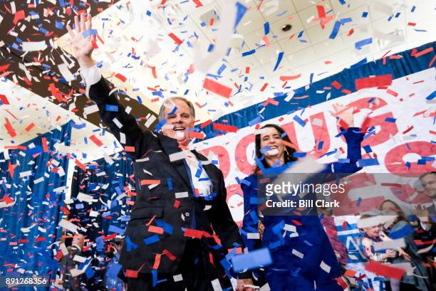 Alabama Democrat Doug Jones celebrate his victory over Judge Roy Moore at the Sheraton in Birmingham, Ala., on Tuesday, Dec. 12, 2017. Jones is faced...