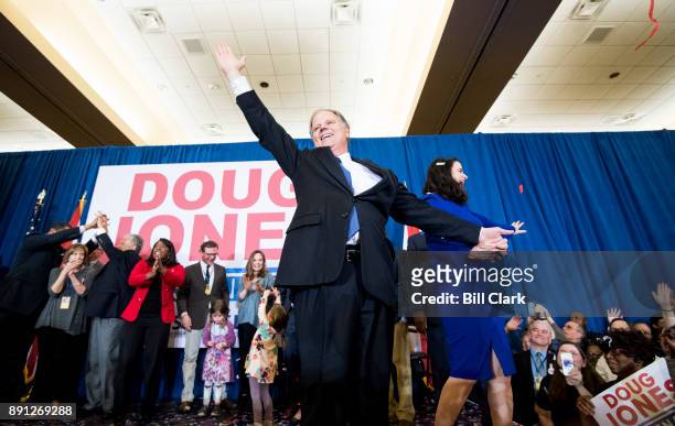 Alabama Democrat Doug Jones and his wife celebrate his victory over Judge Roy Moore at the Sheraton in Birmingham, Ala., on Tuesday, Dec. 12, 2017....