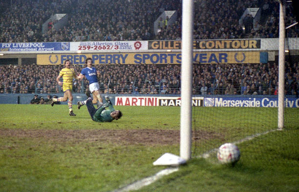 Gordon Davies of Chelsea scores a goal past Neville Southall of Everton during the Canon League Division One match between Everton and Chelsea held... Gordon Davies of Chelsea scores a goal past Neville Southall of Everton during the Canon League Division One match between Everton and Chelsea held...
