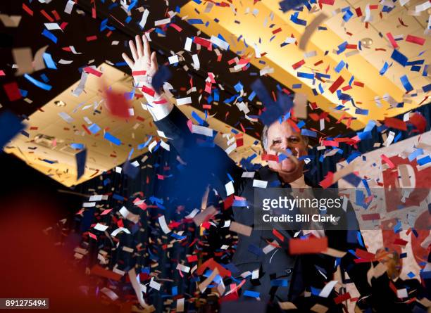 Alabama Democrat Doug Jones celebrates his victory over Judge Roy Moore at the Sheraton in Birmingham, Ala., on Tuesday, Dec. 12, 2017. Jones faced...