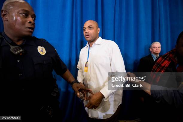 Former NBA star Charles Barkley makes his way backstage to help Alabama Democrat Doug Jones celebrate his victory over Judge Roy Moore at the...