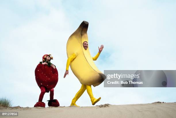 fruit people - men doing quirky things stock pictures, royalty-free photos & images