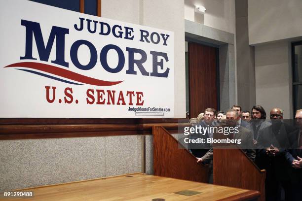Roy Moore, a Republican from Alabama, stands off stage during an election night party in Montgomery, Alabama, U.S., on Tuesday, Dec. 12, 2017. The...