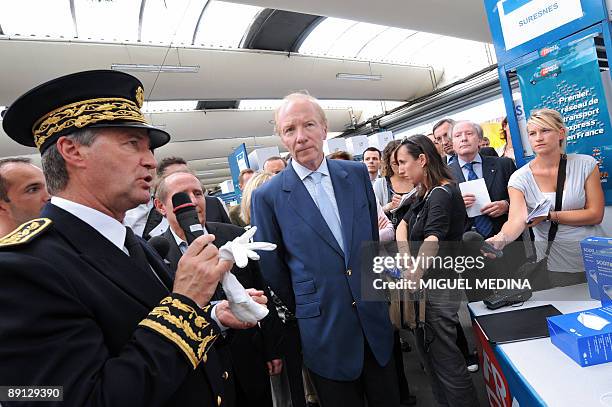 French Interior minister Brice Hortefeux listens to the Hauts-de-Seine prefect Patrick Strzoda on July 21, 2009 in Nanterre, a Paris western suburb,...