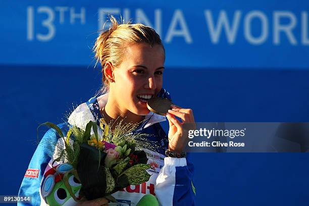 Tania Cagnotto of Italy receives the bronze medal in theWomen's 3m Springboard Final at the Stadio del Nuoto on July 21, 2009 in Rome, Italy.