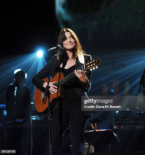 French First Lady Carla Bruni-Sarkozy performs during the Mandela Day: A 46664 Celebration Concert at Radio City Music Hall on July 18, 2009 in New...