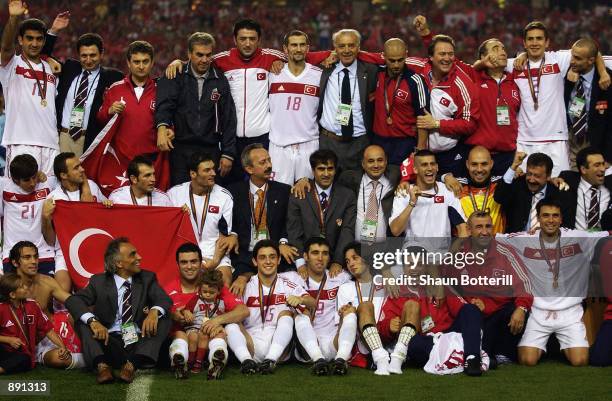 Turkey celebrate finishing in third place after the FIFA World Cup Finals 2002 Third Place Play-Off match between South Korea and Turkey played at...