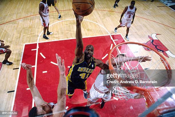Mark West of the Indiana Pacers shoots a layup against the Chicago Bulls in Game Five of the Eastern Conference Finals during the 1998 NBA Playoffs...