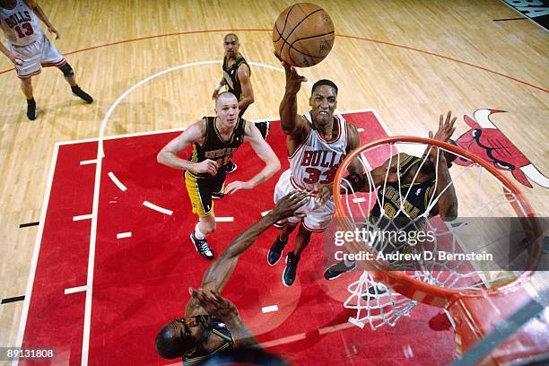 Scottie Pippen of the Chicago Bulls shoots a layup against the Indiana Pacers in Game Five of the Eastern Conference Finals during the 1998 NBA...