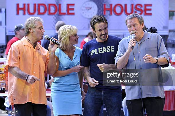 Actor David Arquette performs with Fox's Gretchen Carlson and a doo wop band on Fox & Friends at Fox Plaza on July 15, 2009 in New York City.