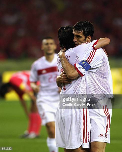 Hakan Sukur of Turkey congratulates team-mate Ilhan Mansiz after he scored the third goal during the FIFA World Cup Finals 2002 Third Place Play-Off...