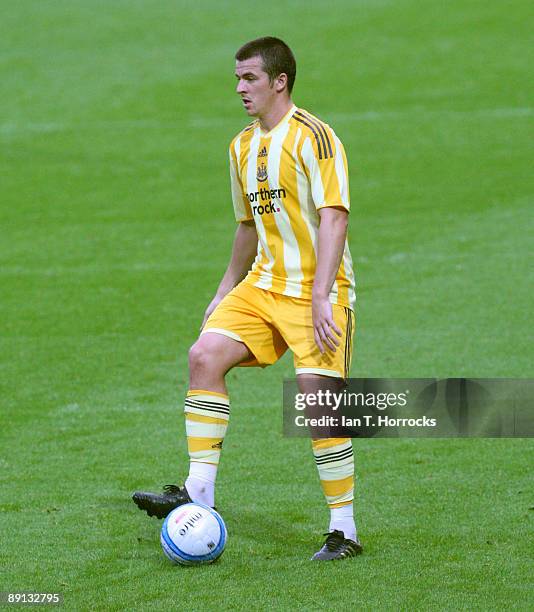 Joey Barton in action during a pre-season friendly match between Huddersfield Town and Newcastle United at the Galpharm Stadium on July 21, 2009 in...