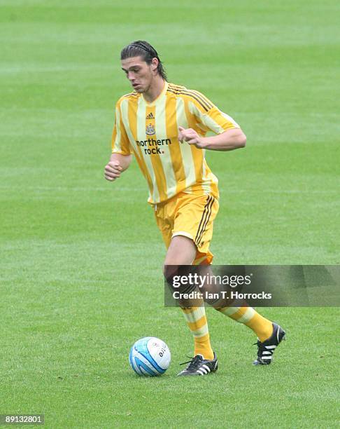 Andy Carroll during a pre-season friendly match between Huddersfield Town and Newcastle United at the Galpharm Stadium on July 21, 2009 in...