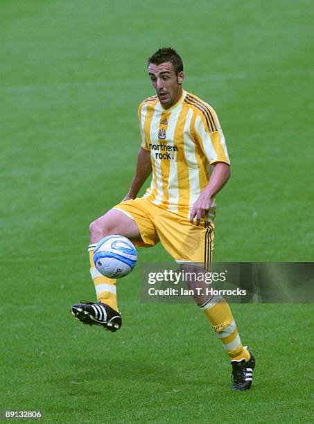 Jose Enrique in action during a pre-season friendly match between Huddersfield Town and Newcastle United at the Galpharm Stadium on July 21, 2009 in...