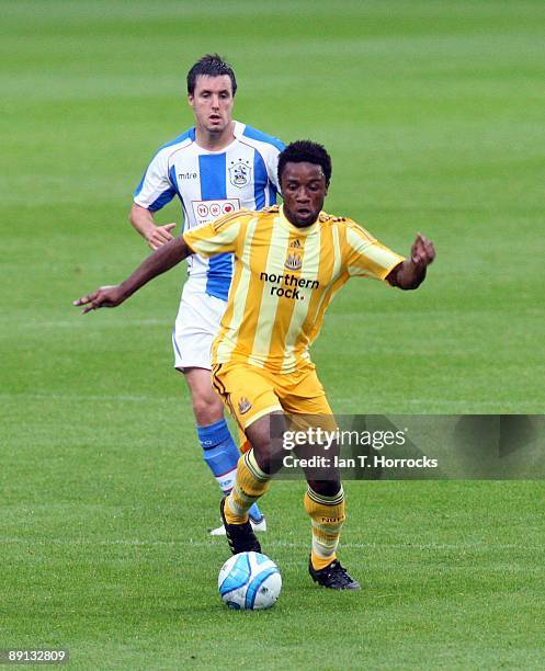 Kazenga Lua Lua in action during a pre-season friendly match between Huddersfield Town and Newcastle United at the Galpharm Stadium on July 21, 2009...