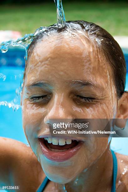 close-up of a teenage girl taking bath, uruguay - running water bath stock pictures, royalty-free photos & images