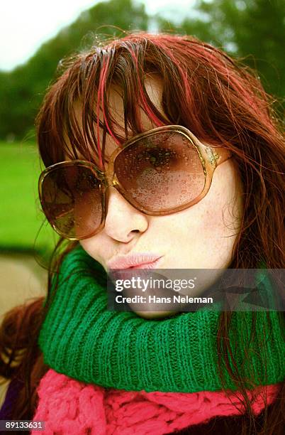 woman wearing big glasses and puckering her lips, odessa, ukraine - big sunglasses stock pictures, royalty-free photos & images