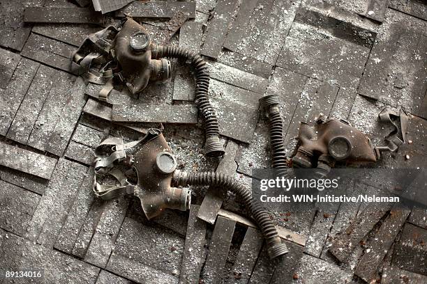 high angle view of gas masks, prypiat, ukraine - retombée radioactive photos et images de collection