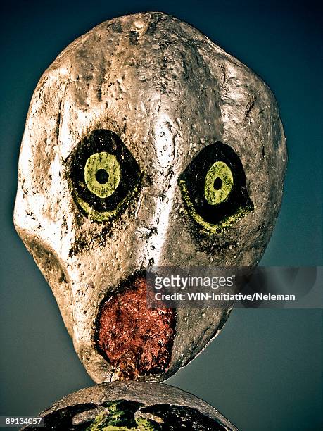 close-up of a scarecrow face painted on a stone - scarecrow faces stock pictures, royalty-free photos & images