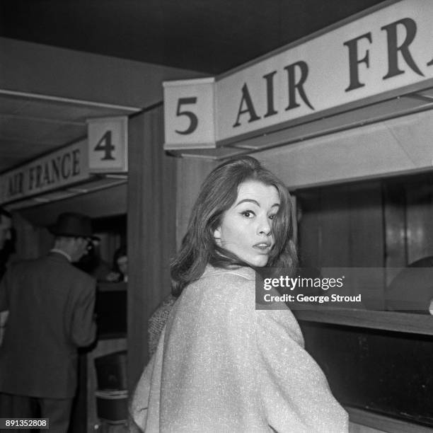 British showgirl and fashion model, known for her role in the Profumo Affair, Christine Keeler at Heathrow Airport, London, UK, 20th May 1963.