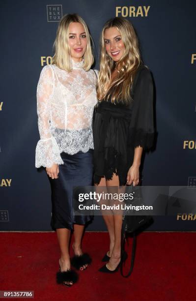 Sydney Morris and Dallas Wand attend FORAY Collective and The Black Tux Host Holiday Gala on December 12, 2017 in Los Angeles, California.