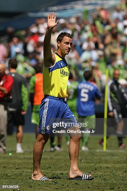 John Terry of Chelsea FC waves to the crowd following the game against Seattle Sounders FC on July 18, 2009 at Qwest Field in Seattle, Washington.