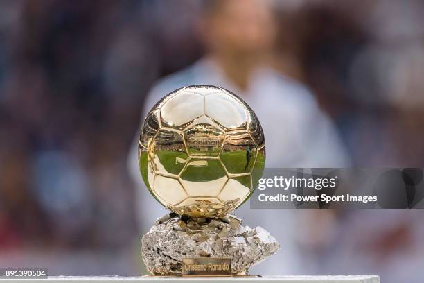 Cristiano Ronaldo of Real Madrid shows his FIFA Ballon Dor Trophies during the La Liga 2017-18 match between Real Madrid and Sevilla FC at Santiago...