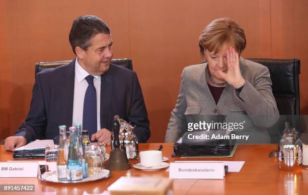 German Chancellor Angela Merkel and Vice Chancellor and Foreign Minister Sigmar Gabriel arrive for the weekly German federal Cabinet meeting on...